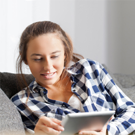 Picture of a college-age girl checking her bank balances online on her tablet